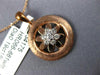 ESTATE .19CT DIAMOND 18KT ROSE GOLD CIRCLE OF LIFE MATTE & SHINY FLOWER PENDANT