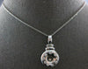 ESTATE .52CT DIAMOND 14KT WHITE GOLD ROUND ETOILE CIRCULAR LOVE FLOATING PENDANT