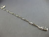 .26CT DIAMOND 14KT WHITE GOLD ROUND BEZEL ETOILE TRIANGULAR FUN TENNIS BRACELET