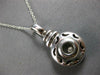 ESTATE .52CT DIAMOND 14KT WHITE GOLD ROUND ETOILE CIRCULAR LOVE FLOATING PENDANT