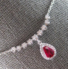 .78CT DIAMOND & AAA RUBY 14KT WHITE GOLD PEAR SHAPE & ROUND HALO LOVE NECKLACE