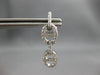 .68CT DIAMOND 18KT WHITE GOLD 3D CLASSIC DOUBLE LOVE KNOT FUN HANGING EARRINGS