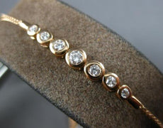 .35CT DIAMOND 18KT ROSE GOLD BEZEL 7 STONE GRADUATING ADJUSTABLE TENNIS BRACELET