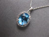 1.67CT DIAMOND & AAA BLUE TOPAZ 14KT WHITE GOLD 3D OVAL & ROUND FLOATING PENDANT