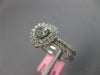.95CT DIAMOND 18KT WHITE GOLD 3D HEART SHAPE & ROUND DOUBLE HALO ENGAGEMENT RING
