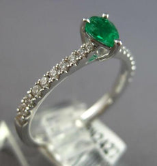 .46CT DIAMOND & AAA EMERALD 18KT WHITE GOLD PEAR SHAPE & ROUND FRIENDSHIP RING