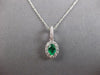 .56CT DIAMOND & AAA COLUMBIAN EMERALD 14KT WHITE GOLD OVAL HALO FLOATING PENDANT