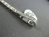 ESTATE .75CT DIAMOND 14KT WHITE GOLD 3D OPEN HEART LOVE KNOT TENNIS BRACELET