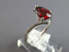 1.18CT DIAMOND & AAA GARNET 14KT WHITE GOLD PEAR SHAPE & ROUND CRISS CROSS RING