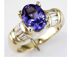 3.70CT DIAMOND & AAA TANZANITE 14KT YELLOW GOLD OVAL & BAGUETTE ENGAGEMENT RING
