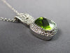 1.46CT DIAMOND & AAA PERIDOT 14KT WHITE GOLD 3D CUSHION & ROUND FLOATING PENDANT