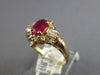 1.05CT DIAMOND & AAA RUBY 14K YELLOW GOLD OVAL ROUND & BAGUETTE FLOWER LOVE RING