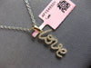 ESTATE .16CT DIAMOND 14KT YELLOW GOLD 3D CLASSIC SCRIPT LOVE FLOATING PENDANT