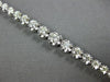 ESTATE 2.73CT DIAMOND 14KT WHITE GOLD 3D ROUND GRADUATING LOVE TENNIS BRACELET