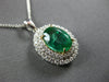 2.76CT DIAMOND & AAA EMERALD 18KT 2 TONE GOLD OVAL & ROUND HALO FLOATING PENDANT