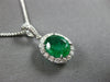 2.03CT DIAMOND & AAA EMERALD 18KT WHITE GOLD OVAL & ROUND HALO FLOATING PENDANT