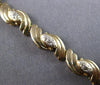 ESTATE .15CT DIAMOND 14KT 2 TONE GOLD 3D INFINITY LOVE TENNIS BRACELET #20842