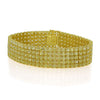 LARGE 61.12CT FANCY YELLOW DIAMOND 18KT YELLOW GOLD CUSHION CUFF TENNIS BRACELET