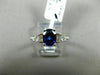2.27CT ROUND & EMERALD DIAMOND & SAPPHIRE 18KT WHITE GOLD OVAL ENGAGEMENT RING