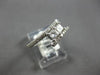 .63CT DIAMOND 14KT WHITE GOLD 3D PRINCESS & ROUND 2 STONE CRISS CROSS LOVE RING