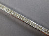 ESTATE 5.42CT DIAMOND 14KT WHITE GOLD PRINCESS CHANNEL INVISIBLE TENNIS BRACELET
