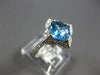 1.88CT DIAMOND & AAA BLUE TOPAZ 14K 2 TONE GOLD CUSHION & ROUND GEOMETRICAL RING