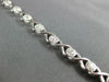 ESTATE .89CT DIAMOND 14KT WHITE GOLD 3D ROUND CLASSIC XO TENNIS BRACELET