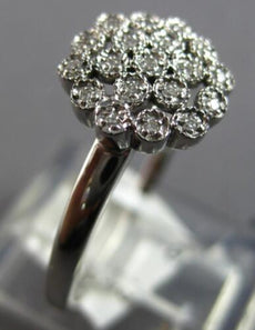 ESTATE .06CT DIAMOND 14K WHITE GOLD 3D ROUND FLOWER SNOWFLAKE FILIGREE FUN RING