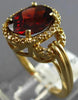 ESTATE 2.64CT DIAMOND & AAA GARNET 14KT YELLOW GOLD OVAL & ROUND LOVE KNOT RING