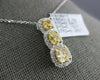 ESTATE 1.68CT WHITE & FANCY YELLOW DIAMOND 18KT 2 TONE GOLD HALO 3 STONE PENDANT