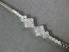 ESTATE .91CT DIAMOND 18KT WHITE GOLD 3D ROUND GEOMETRICAL CLUSTER SNAKE BRACELET