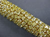 EXTRA LARGE GIA 47.4CT FANCY YELLOW DIAMOND 18K YELLOW GOLD CUFF TENNIS BRACELET