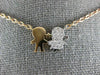 ESTATE .16CT DIAMOND 18KT WHITE & ROSE GOLD 3D BABY BOY & GIRL FUN NECKLACE