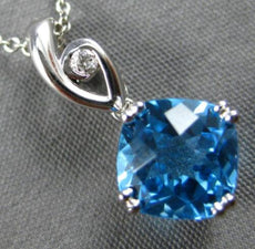 1.73CT DIAMOND & AAA BLUE TOPAZ 14KT WHITE GOLD CUSHION & ROUND FLOATING PENDANT