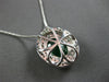 LARGE 4.03CT DIAMOND & AAA EMERALD 18KT WHITE GOLD OVAL & ROUND FLOATING PENDANT