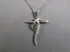 .26CT DIAMOND 14KT WHITE GOLD 3D DOUBLE SWIRL LOVE KNOT CROSS FLOATING PENDANT
