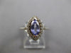 1.11CT DIAMOND & AAA TANZANITE 14KT WHITE GOLD MARQUISE & ROUND ENGAGEMENT RING