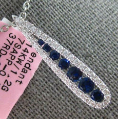 79CT DIAMOND & AAA SAPPHIRE 14KT WHITE GOLD 3D JOURNEY OPEN TEAR DROP PENDANT