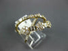 LARGE .99CT DIAMOND 14KT YELLOW GOLD ROUND & BAGUETTE MULTI FLOWER INFINITY RING