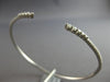 .49CT DIAMOND 18KT WHITE GOLD ROUND GRADUATING JOURNEY FLEXIBLE BANGLE BRACELET