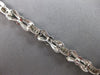 .59CT DIAMOND 14KT WHITE GOLD 3D ROUND 3 STONE XO FILIGREE LOVE TENNIS BRACELET