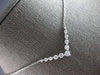 .59CT DIAMOND 14KT WHITE GOLD 3D GRADUATING V SHAPE SHARED PRONG LOVE NECKLACE