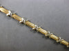 ESTATE 14KT WHITE AND YELLOW GOLD 3D SOLID X LOVE BRACELET