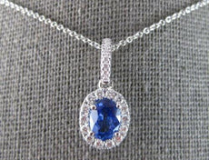 1.28CT DIAMOND & AAA CEYLON SAPPHIRE 14KT WHITE GOLD OVAL HALO FLOATING PENDANT