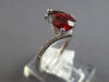 1.18CT DIAMOND & AAA GARNET 14KT WHITE GOLD PEAR SHAPE & ROUND CRISS CROSS RING