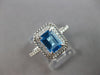 1.44CT DIAMOND & AAA BLUE TOPAZ 14KT WHITE GOLD 3D EMERALD CUT & ROUND HALO RING