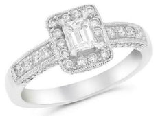 1.06CT DIAMOND 18KT WHITE GOLD EMERALD CUT & ROUND RECTANGULAR ENGAGEMENT RING