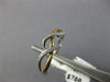 ESTATE .06CT DIAMOND 14KT WHITE AND YELLOW GOLD 3D CLASSIC INFINITY LOVE RING