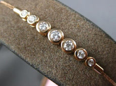.35CT DIAMOND 14KT ROSE GOLD BEZEL 7 STONE GRADUATING ADJUSTABLE TENNIS BRACELET