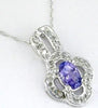 .65CT DIAMOND & AAA TANZANITE 14K WHITE GOLD CLASSIC OVAL & ROUND FLOWER PENDANT